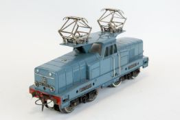 An seldom seen French Hornby O gauge centre cab twin pantograph 3 rail 20V electric locomotive. In