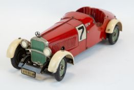 A rare original 1930's Marklin clockwork Mercedes-Benz SSK 2 seater sports racing car (1103). In red