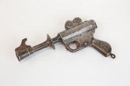 2 scarce vintage metal and tin space guns. Nu-matic cap gun, made in U.S.A. fires paper caps from