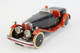 A rare 1930's No.2 Meccano Constructor Car. An example in black with red mudguards/running boards,