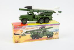Dinky Toys Honest John Missile Launcher (665). An example in olive green with green plastic platform
