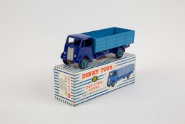 Dinky Toys Guy 4-Ton Lorry (511). Cab and chassis in violet blue with mid blue body and wheels.