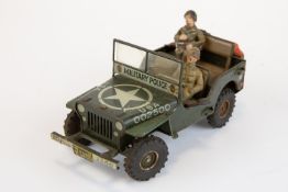 A scarce Arnold made in Germany model of a Willys jeep. Military police issue, body work finished in