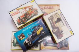 7 unmade plastic kits of Citroens. A Heller 1:16 scale DS19 Cabriolet. Plus 6 1:24 scale- 3 Heller