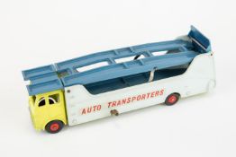 A scarce Dinky Supertoys American export Car Transporter Auto Transporter (989). Lemon yellow cab,