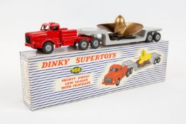 Dinky Supertoys Mighty Antar Low Loader with Propeller load (986). Red tractor unit with driver