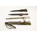 4 bayonets: a Swedish M1965 AK4; a Belgian FN Cal; a Belgian FN Fal; a shortened Lebel bayonet