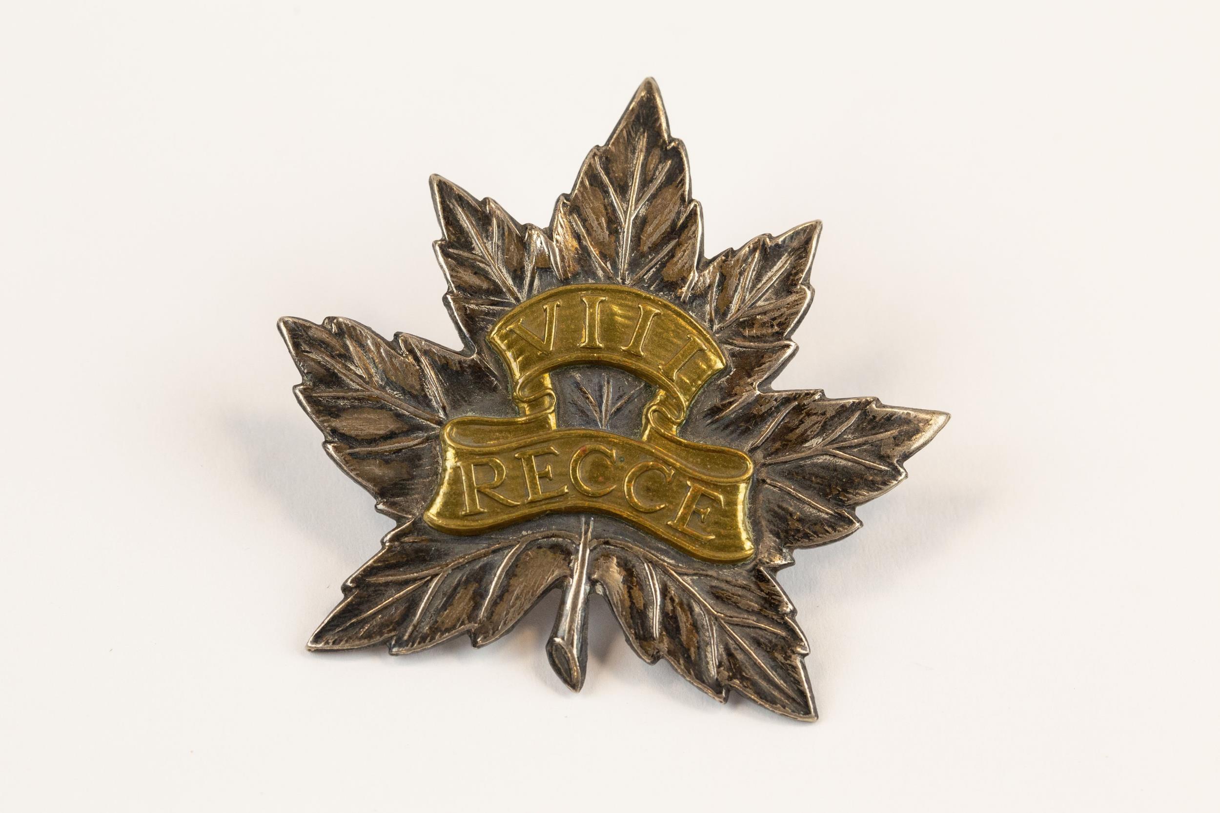 A good scarce WWII Canadian officer's cap badge of the VIIIth Reconnaissance Regiment. GC £200-300