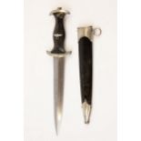 A Third Reich 1933 model SS dagger, the blade etched with RZM and SS marks and "M7/67 1940" (