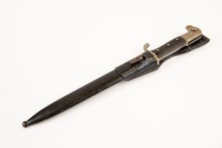 A Third Reich parade bayonet, saw back blade 10" with knights head mark (WKC Solingen), steel hilt