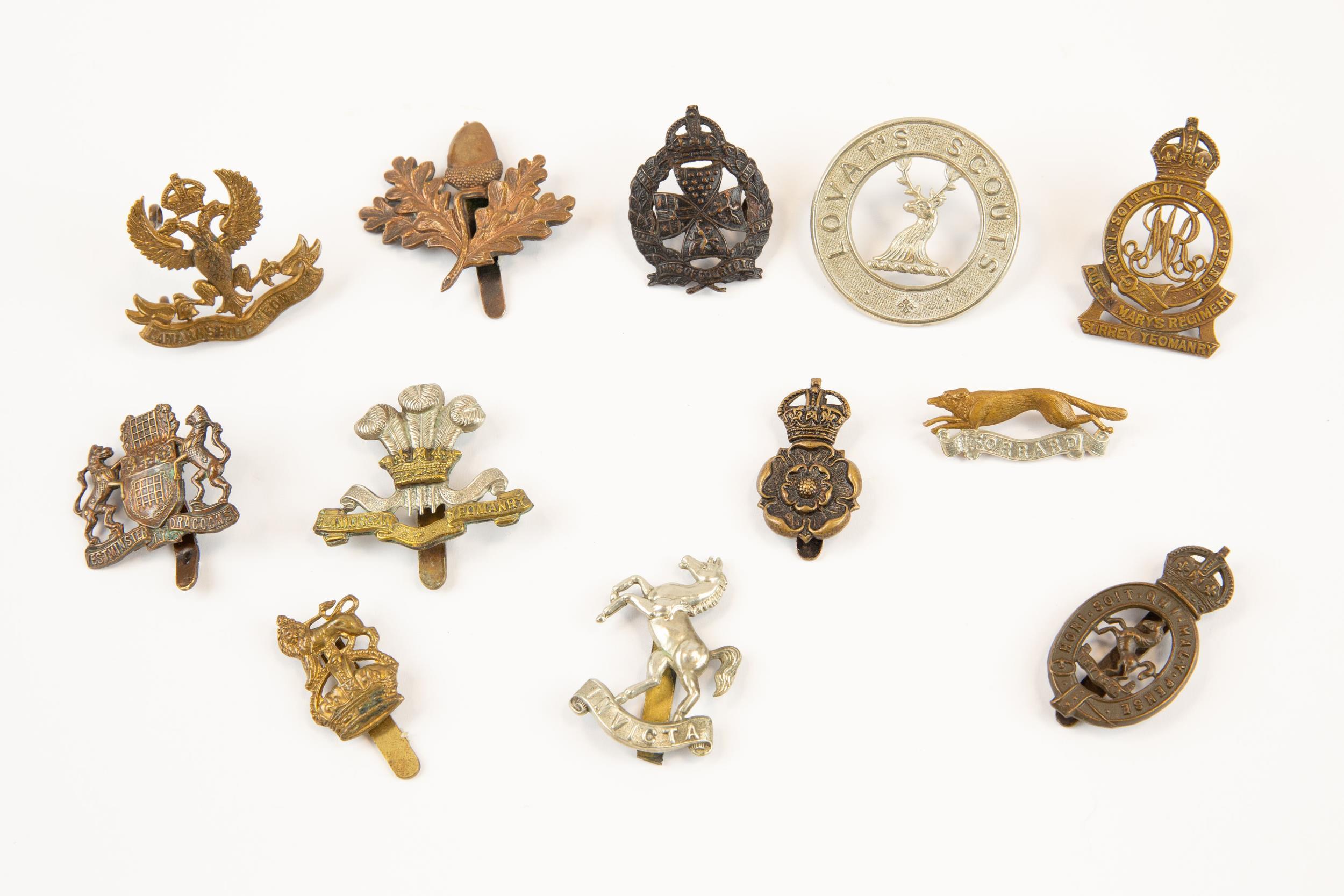 12 Yeomanry cap badges, including Lanarkshire with 4 lugs, South Notts Hussars bronze (cleaned),