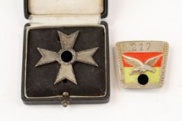 A Third Reich War Merit cross 1st class without swords, the pin with maker's mark "4" in