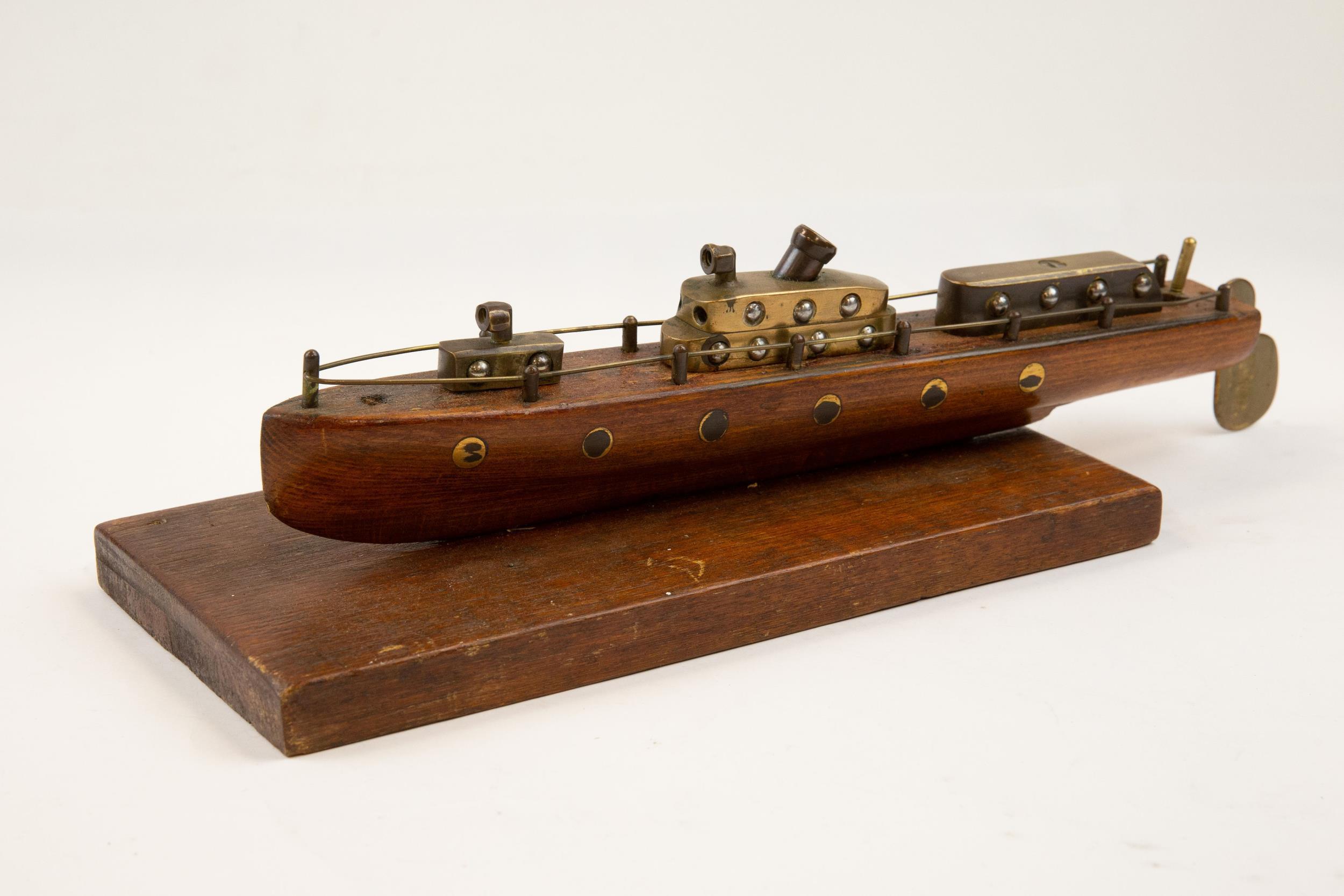 A "trench art" model motor launch, 15" overall, with wooden hull, and brass superstructure, rails - Image 2 of 2