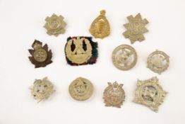 11 Canadian Scottish glengarry badges: Black Watch, Essex Scottish (brass), HLI, 48th Highlanders,