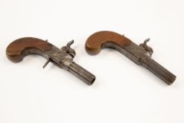 A pair of good quality 55 bore percussion boxlock pocket pistols by H. Nock, London, multi ribbed