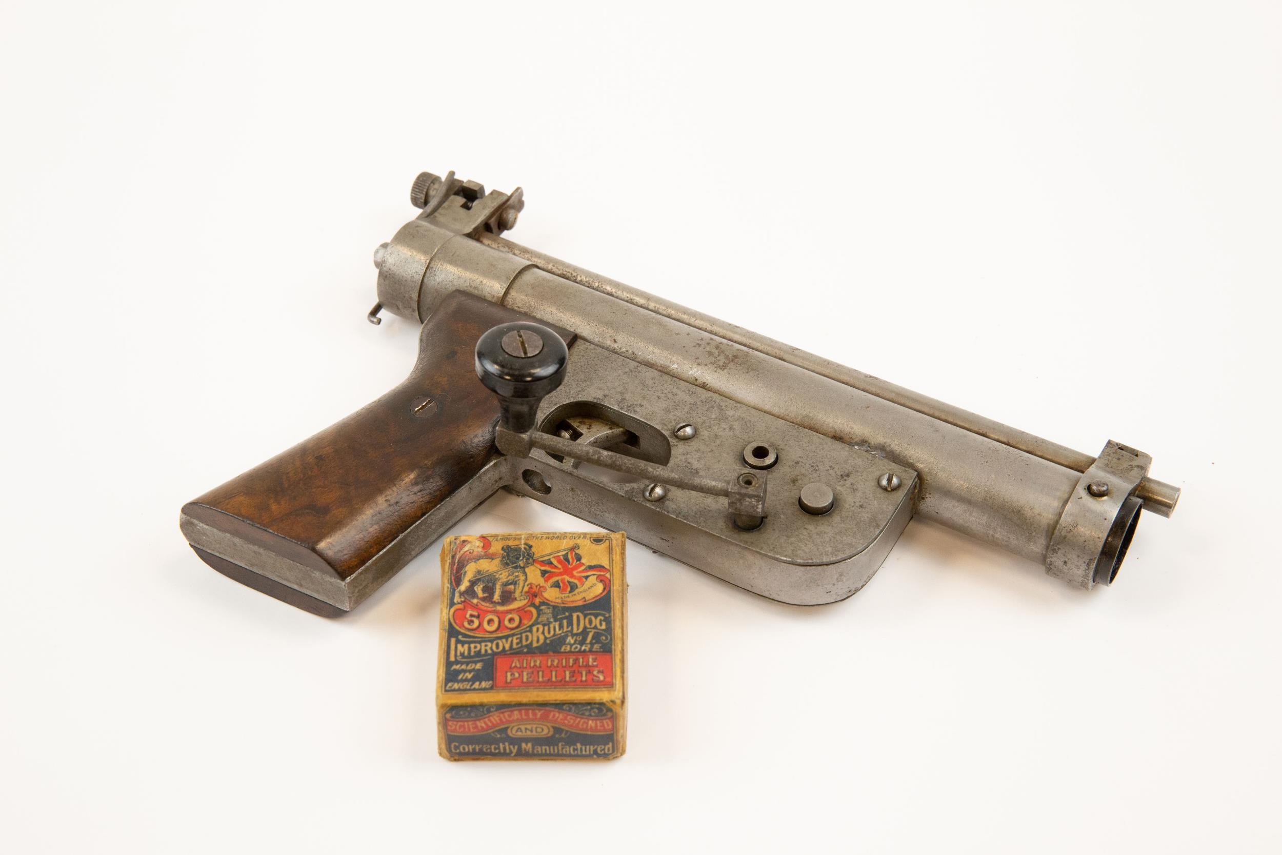 A rare .177" Parker Patent Precision crank wound air pistol, number 262, with plain walnut grips. - Image 2 of 3