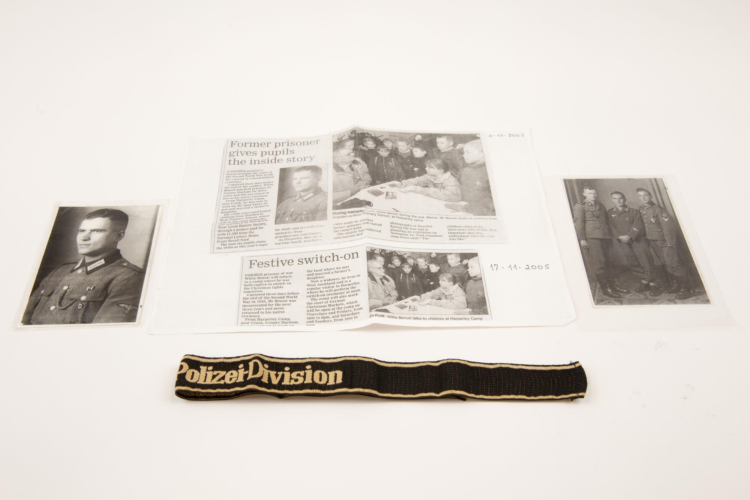 A Third Reich Bevo woven armband of the "SS-Polizei-Division", with the owner's name "W.H. Benoit"