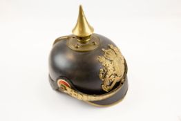 A WWI Bavarian NCOs Pickelhaube, with brass badge, spike, mounts and chinscales, and with leather