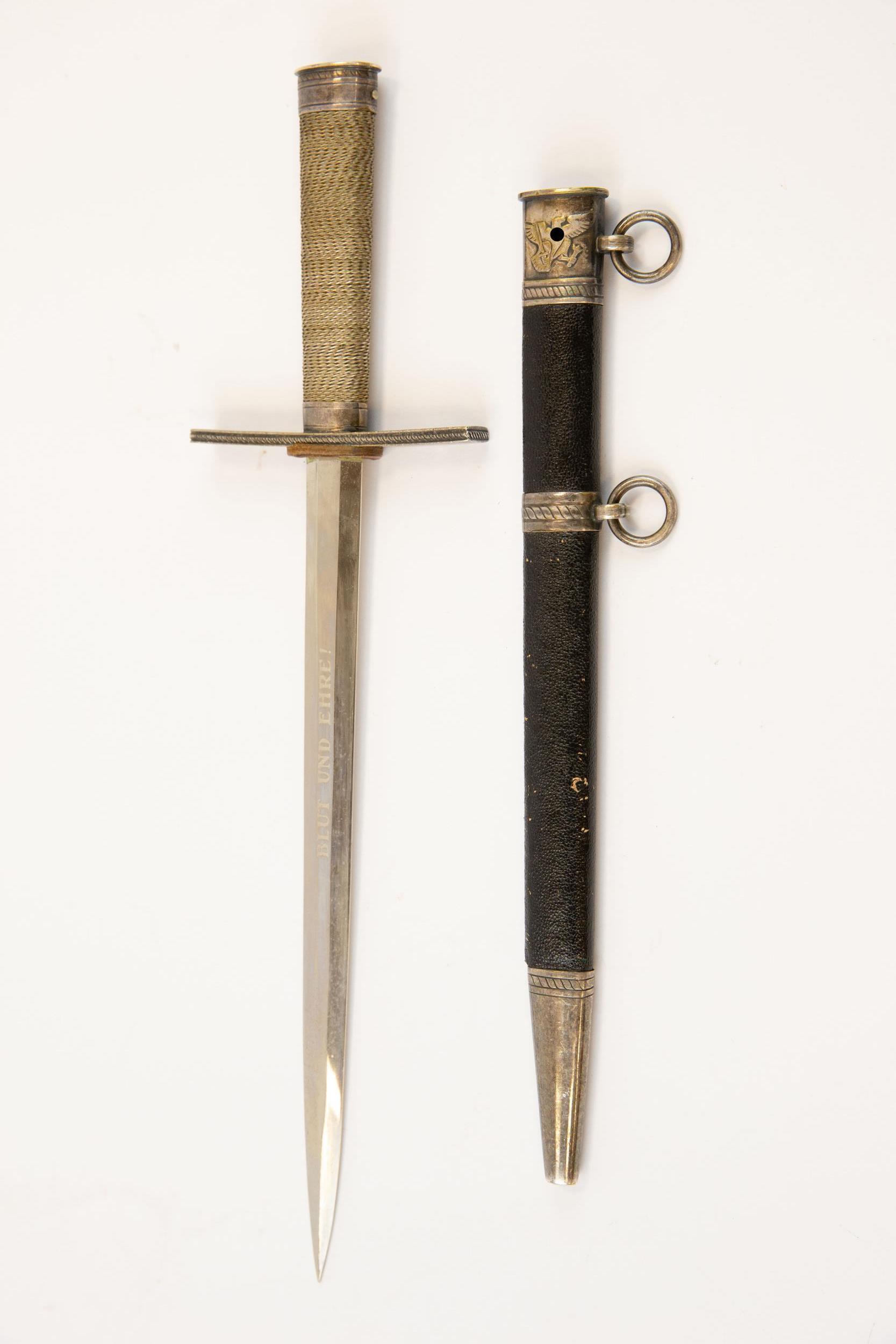 A Third Reich Hitler Youth Leader's dagger, the blade etched with RZM mark and "M7/36" (E & F