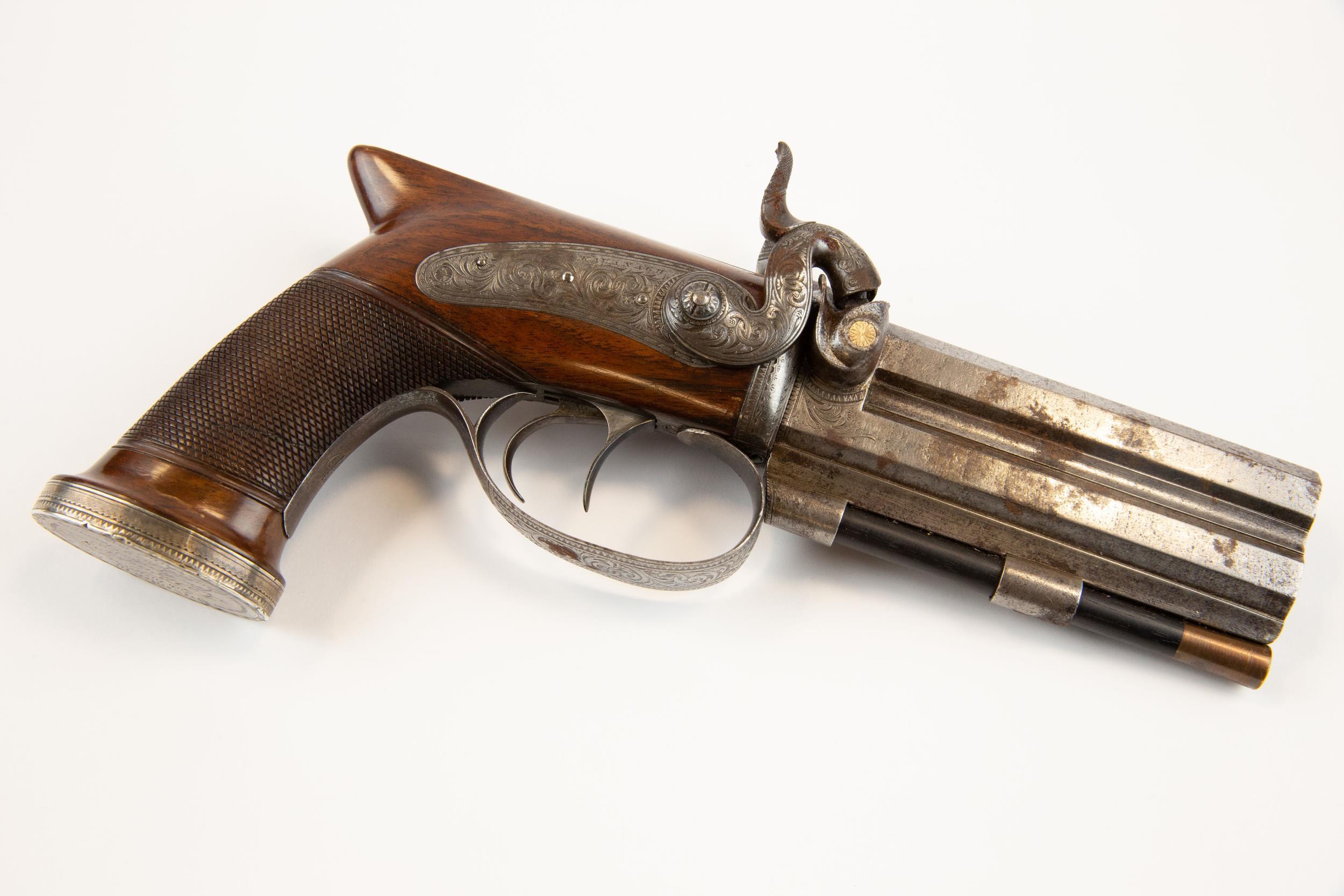An interesting Irish presentation double barrelled over and under 32 bore percussion pistol by