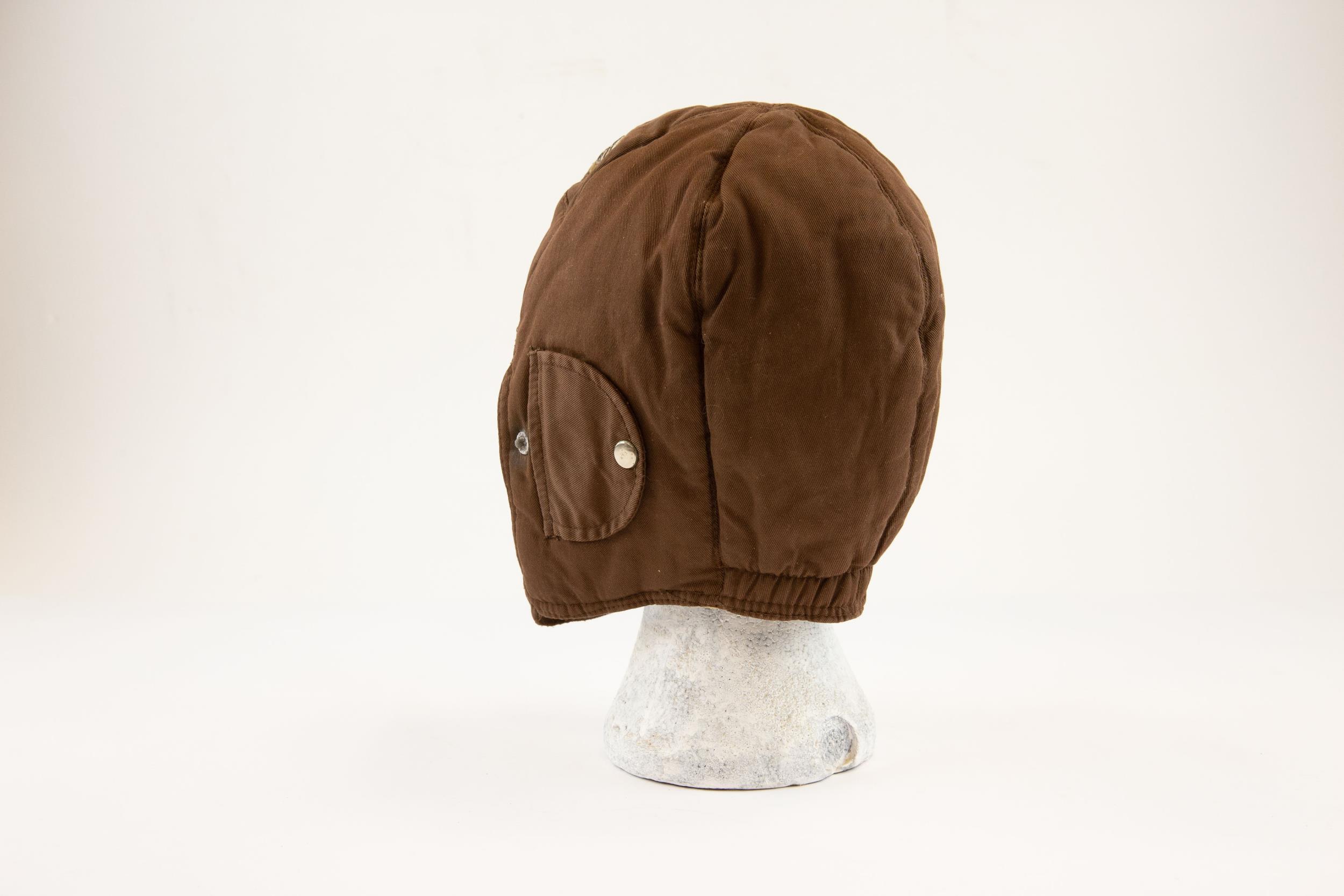 An interesting German brown soft leather flying helmet of the NSFK, with bullion woven Icarus badge. - Image 2 of 2