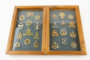 12 Infantry cap badges and 12 Corps cap badges, attractively mounted in two glazed wooden frames,