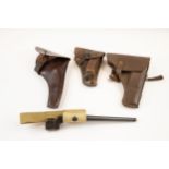 A leather holster for Webley Mk IV Service revolver; another, for Russian Tokarev automatic