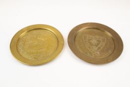 Two WWII Afrika Korps souvenir brass plates, 10" diameter, one embossed and punched "Afrika 1941-