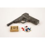 A .177" Diana first model tin plate air pistol, embossed "Diana" above the trigger guard, the ribbed