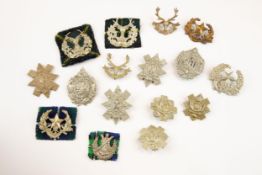 16 Scottish glengarry badges: Cameronians, large, smaller, and blackened brass (worn and