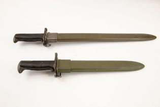 A WWII Garand bayonet, blade 15½" dated 1943; another similar with blade 9¾". Both VGC £120-140