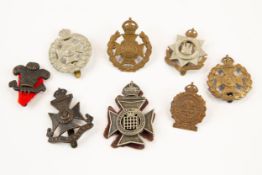 8 London Regiment cap badges: 1st type 12th Bn, 15th Bn, 16th Bn blacked white metal with polished