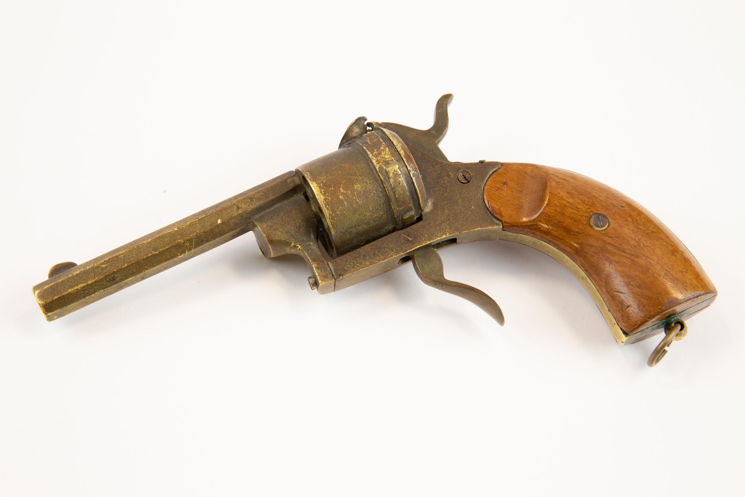 A late 19th century brass cigar cutter, in the form of a pin-fire revolver, 6½" overall, with - Image 2 of 2
