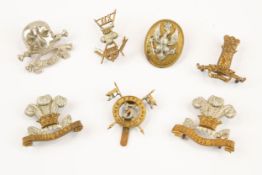 6 early lugged Cavalry cap badges: 3rd Dragoon Guards, 11th Hussars, pre 1903 and post 1903 12th