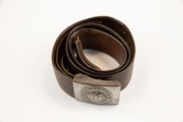 A WWI German steel belt buckle, on its original brown leather belt stamped "Th. Harnach, Breslau 17,