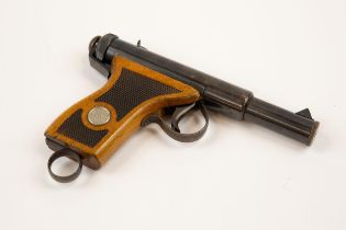 A scarce .177" Haenel Model 100 repeater BB air pistol, c 1930-1939, the one piece beech butt with