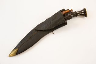 A kukri, blade 12", the hilt of horn with carved band inset with aluminium plaques, and with flat