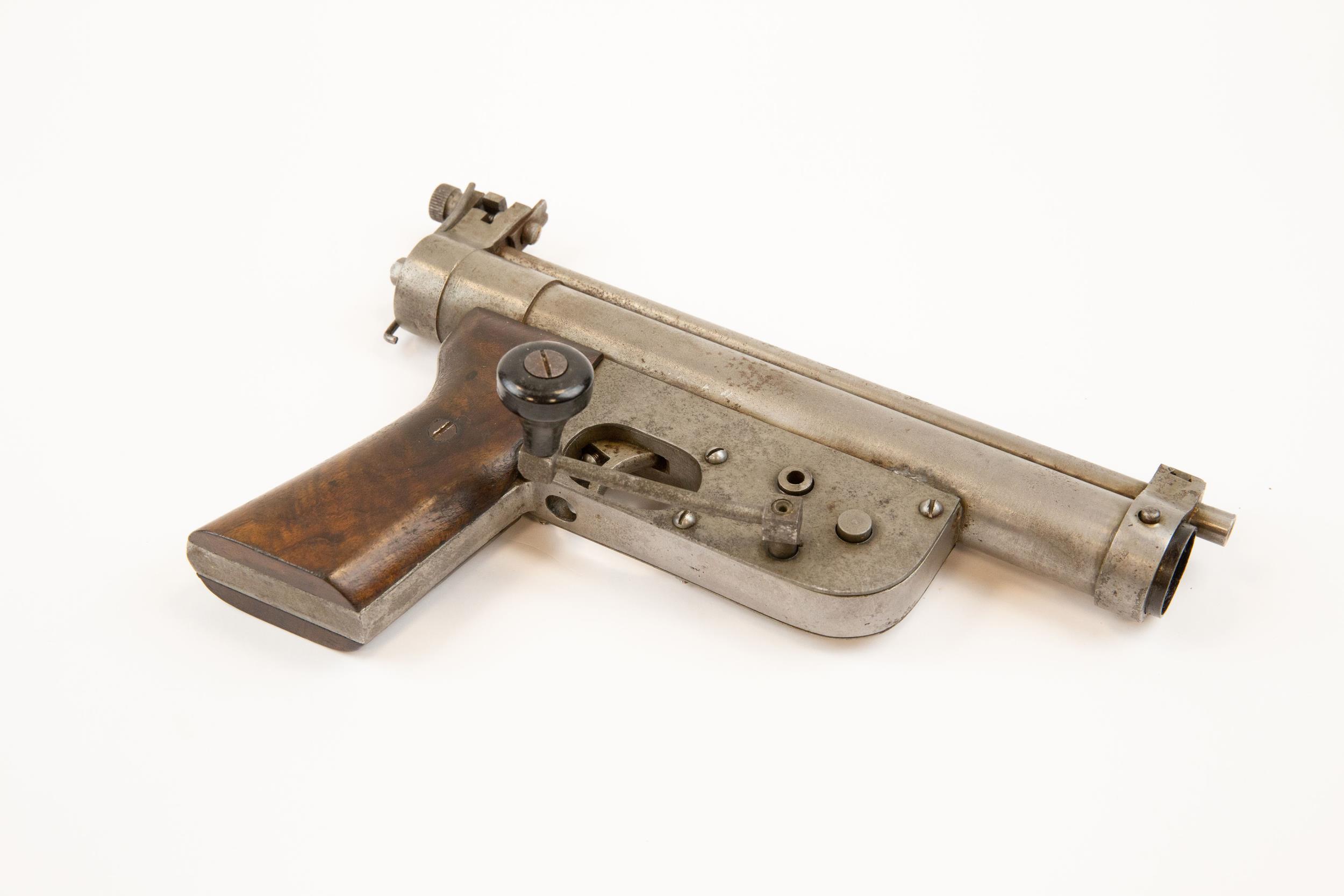 A rare .177" Parker Patent Precision crank wound air pistol, number 262, with plain walnut grips. - Image 3 of 3