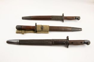 3 India pattern SMLE bayonets with scabbards, 2 with 10" blades; another similar with 12" blade. All