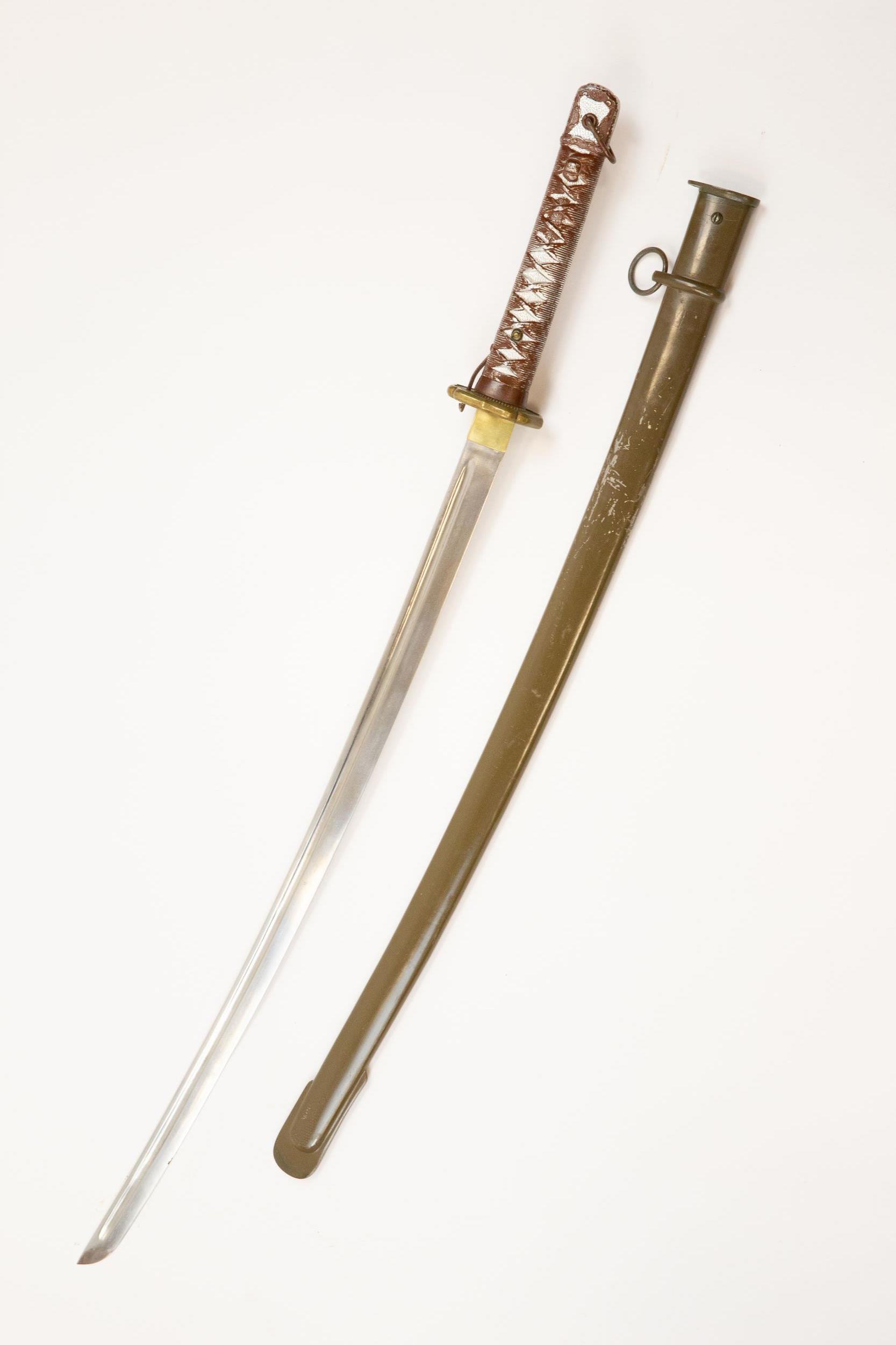 A WWII Japanese NCOs sword, fullered blade 27½", with brown painted aluminium hilt and brass - Image 2 of 2