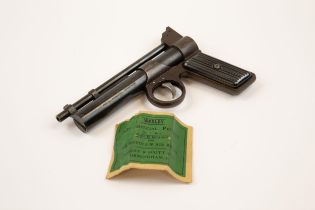 A pre war .177" Webley Junior air pistol, number J18380, with ribbed tinplate grips. GWO & C,