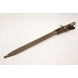 A Swiss M1906 Schmidt Rubin bayonet, saw back blade 19", marked "HS/W 1938", the crosspiece numbered