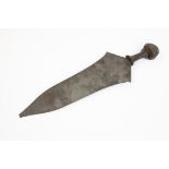 An African knife, probably from the Upper Congo, broad flat blade 16", the hilt with wooden grip and