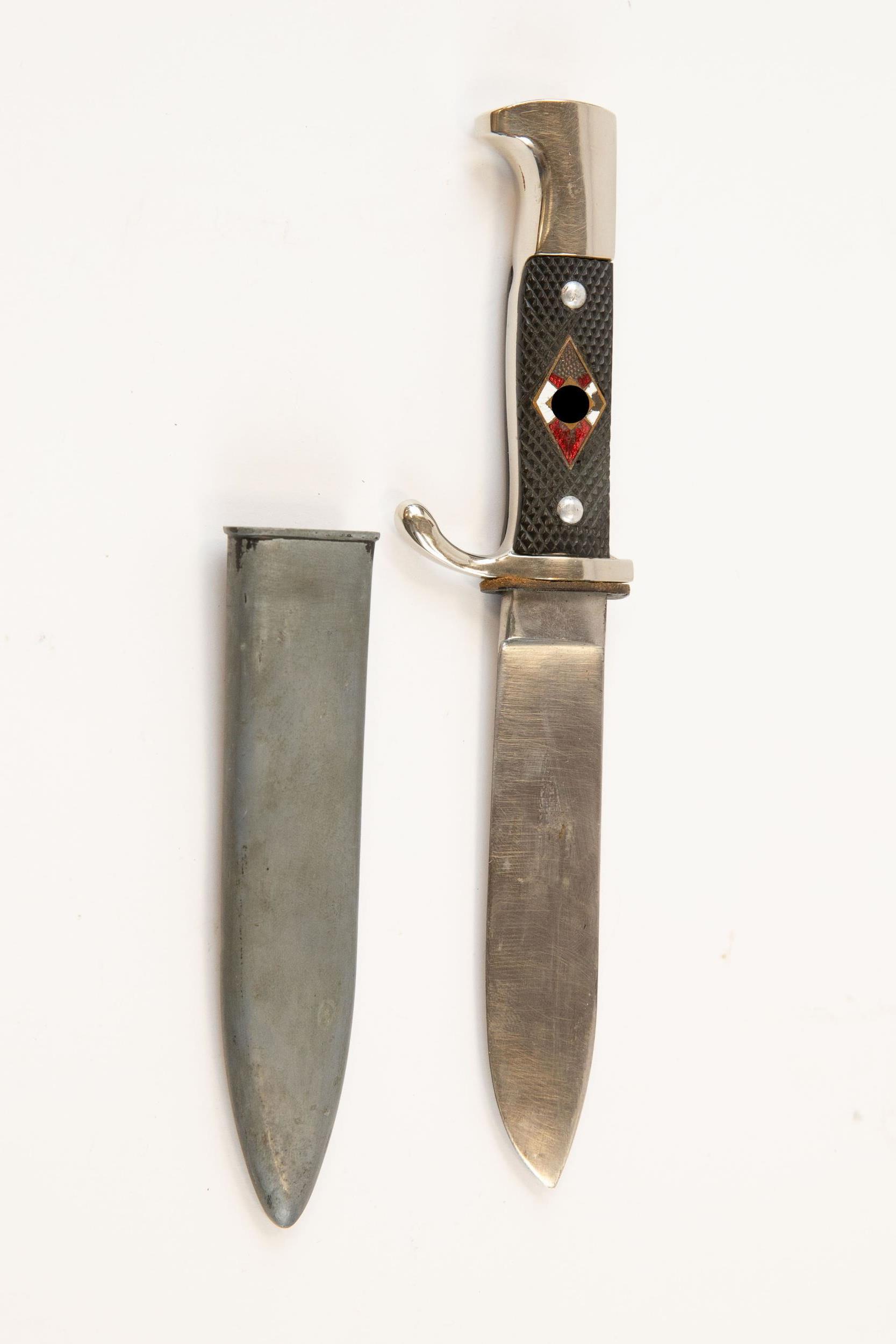 A small size German Youth knife, plain blade 4-3/8", bright plated hilt with chequered black grips