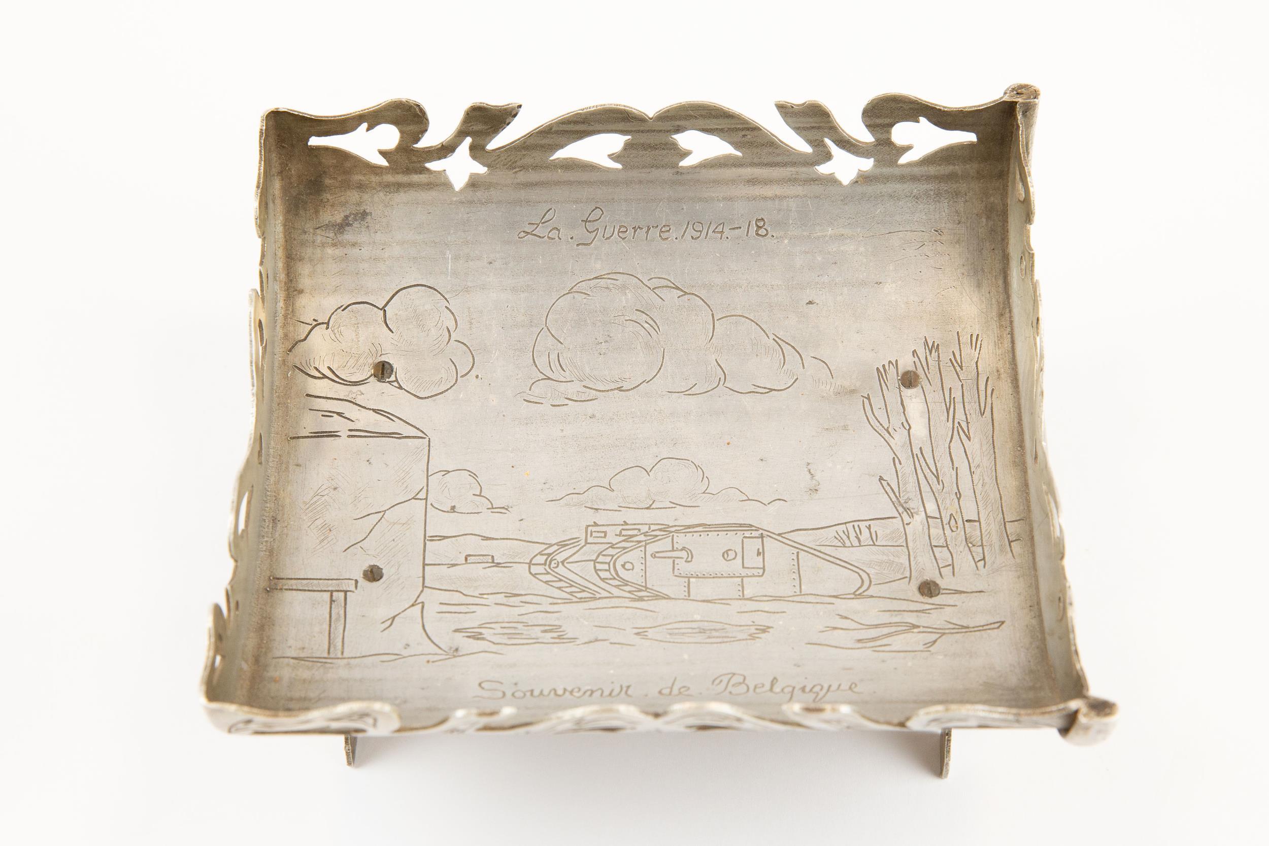 A WWI "Trench Art" souvenir basket or tray, made from a section of an aluminium water bottle,