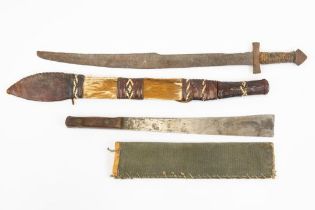 A small Kaskara type sword, heavily pitted, a West African sword with skin covered scabbard (hilt