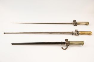 3 French Lebel bayonets, brass hilted with scabbards, WM hilt (no scabbard), also a WM hilt with