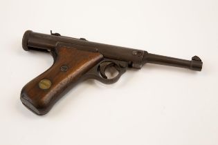 A rifled .177" Haenel Model 28 air pistol, c 1927-1936, number 9672, the air chamber with British