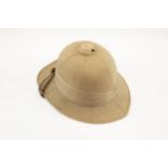 A khaki tropical helmet, probably 1940s, with leather lining and chinstrap. GC £60-80