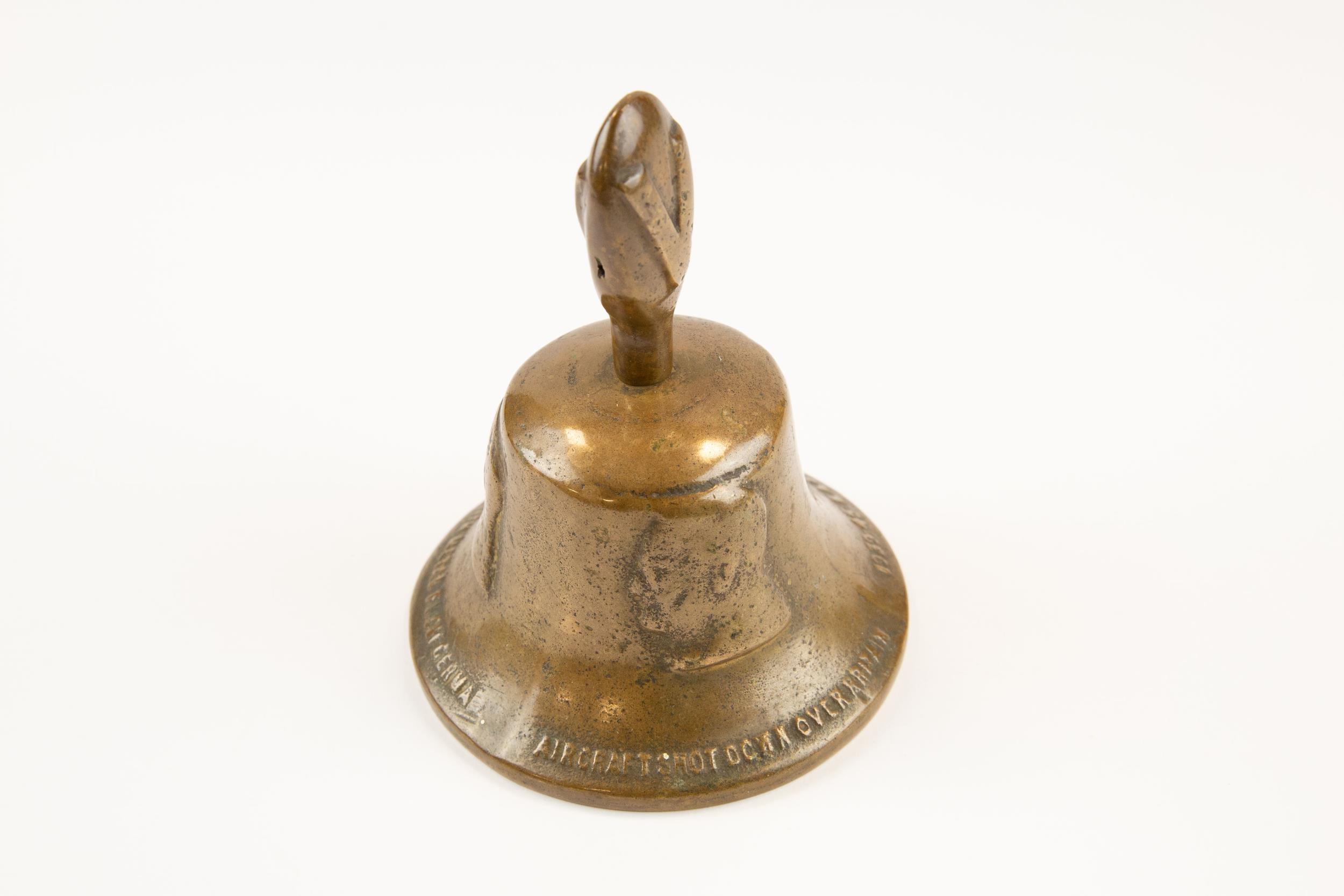 A heavy bronze "Victory" hand bell, embossed with busts of Churchill, Roosevelt and Stalin and